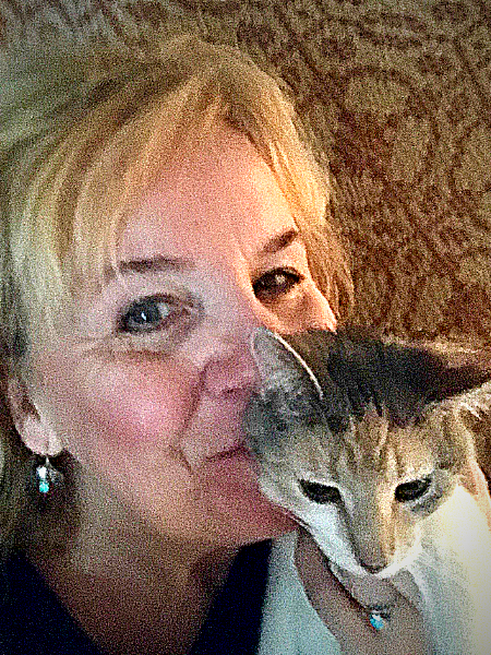 Lori Davidson Co-founder Pet Perennials with her cat Pumpkin