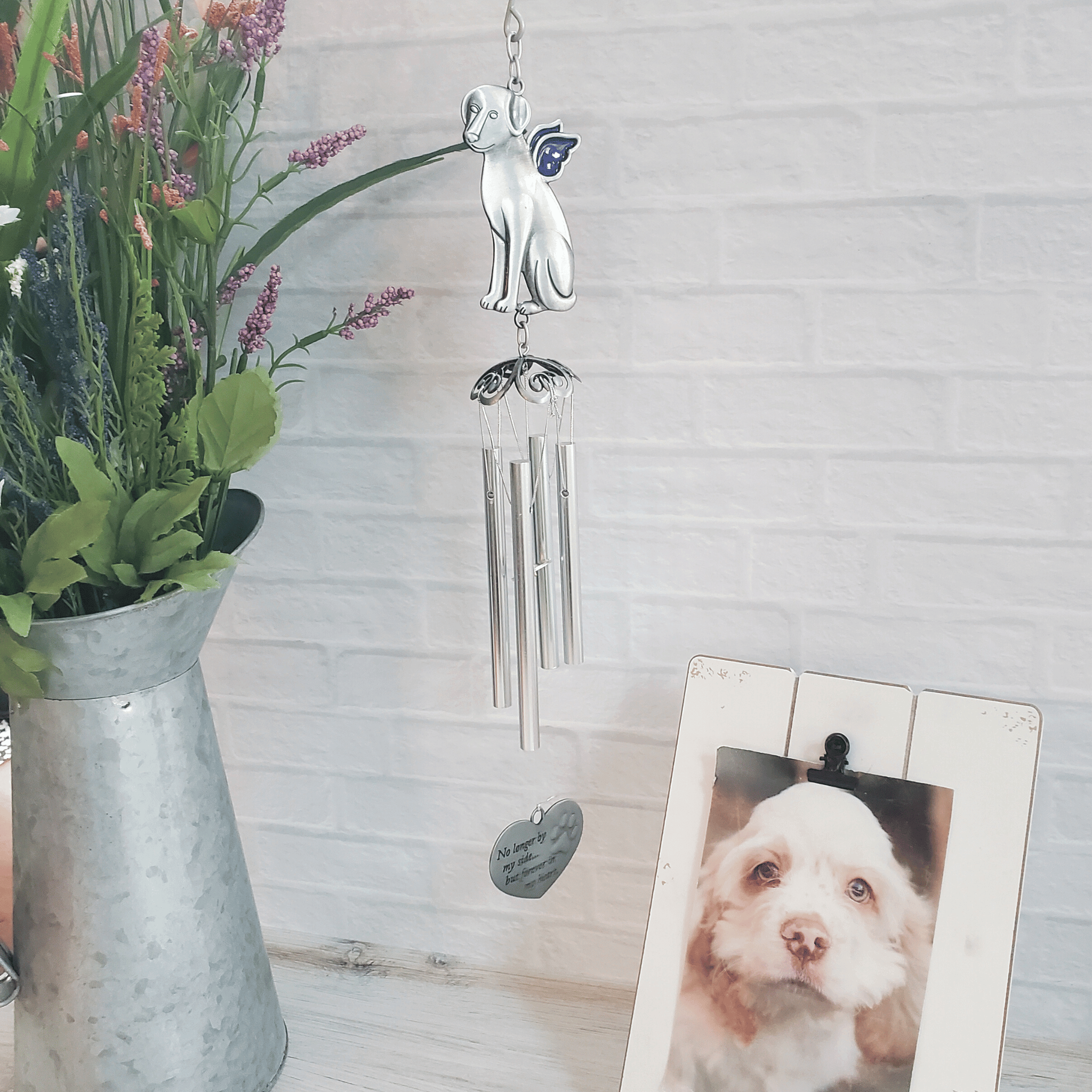 An angel dog wind chime - A thoughtful pet loss gift that can easily be sent to someone in need of something thoughtful after the loss of their pet.