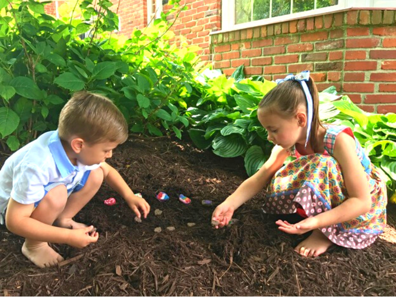 Children planting Pet Perennials Kit wafers in memory of pet